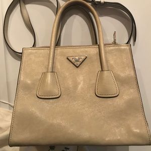 Prada Glacé calf twin pocket handbag in ecru .